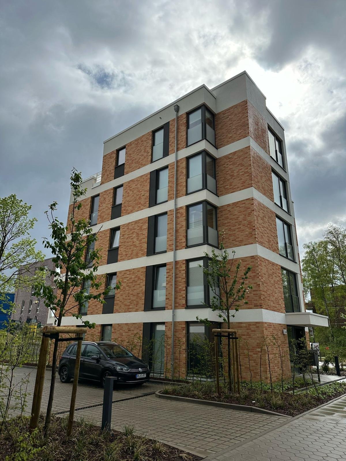 Wohngebäude mit Klinker- und Putzfassade